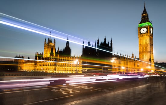 Beautiful bus light trails under Big Ben, London.