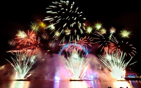 london eye light show and firework during new year eve