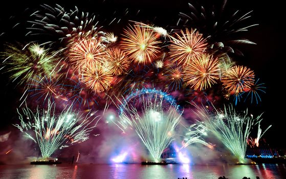 london eye light show and firework during new year eve