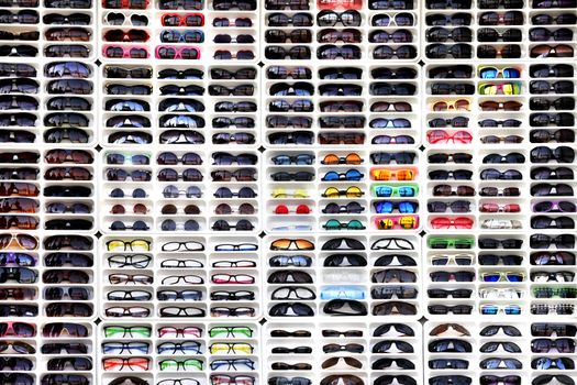 Many different sunglasses in shop