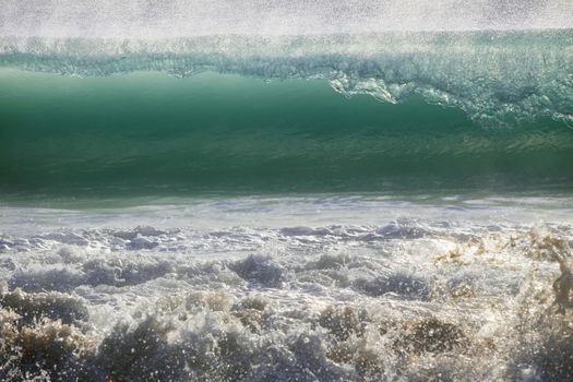 Big wave crashes on to the shore