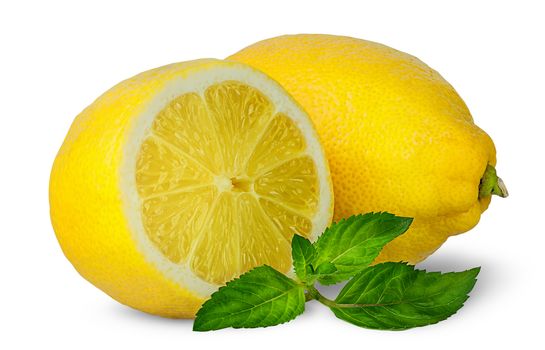 Half and whole lemons with mint isolated on white background