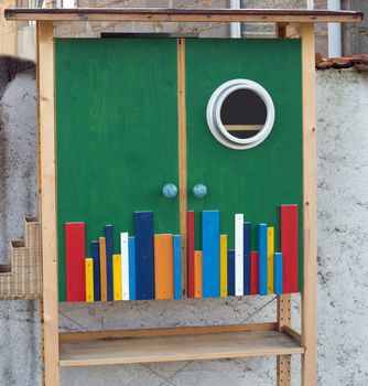 A small outdoor colorful book case, close up