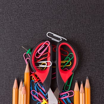 school supplies, stationery accessories on wood background. Flat lay, top view