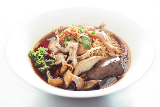 Noodle soup stewed duck put the blood and animal offal. Thailand food Chinese style.