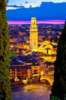 Verona towers and rooftops evening vertical view, tourist destination in Veneto region of Italy