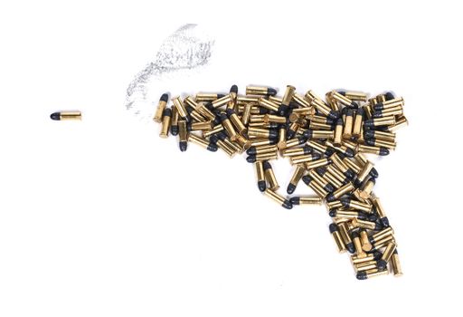 Gun made of ammo isolated against white background