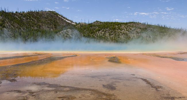 Grand Prismatic Spring as they  walking along path in Midway Geyser Basin, Yellowstone National Park, Wyoming