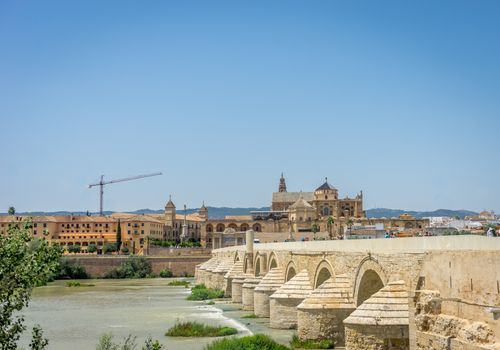 The roman bridge and the Mezquita de Córdoba,the Great Mosque of Córdoba, Mosque-Cathedral,Mezquita of Cordoba across the Guadalquivir river, SPain, Europe, Andalucia