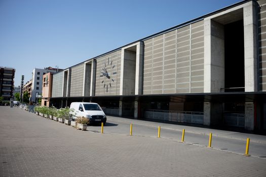 This is a photo of the profile view of the railway station at Cordoba on a summer morning with a blue sky