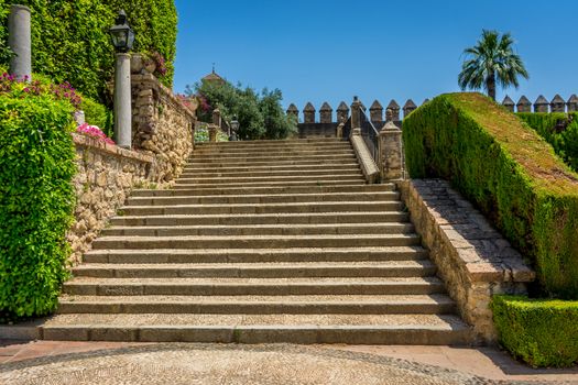 Spanish steps to the orchard in royal gardens of the Alcazar de los Reyes Cristianos castle in Cordoba, Spain, Europe