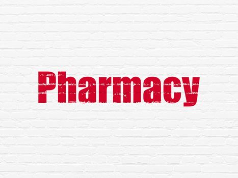 Health concept: Painted red text Pharmacy on White Brick wall background