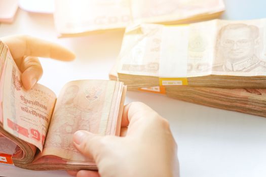 close up image of female hand count the money, business accounting background