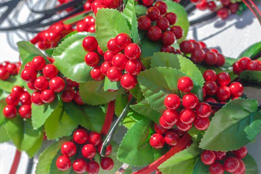 branches artificial berries of viburnum in a beautiful sunny day