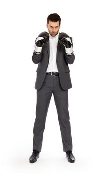 Businessman in boxing gloves isolated on white