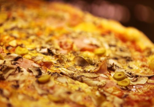 close up of tasty pizza with olives
