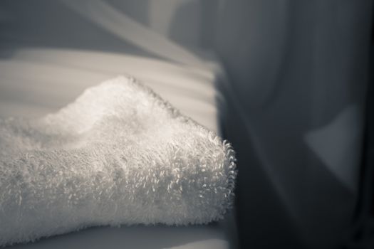White towel on white cloth background.