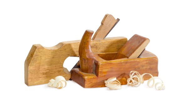 Two old wooden hand planes different special purposes and shavings on a white background
