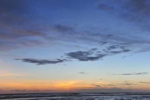 Sunset on the beach with beautiful reflecion and sky