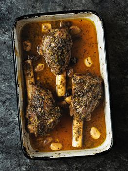 close up of rustic greek roasted lamb shank