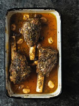 close up of rustic greek roasted lamb shank