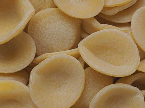 close up of dried italian orecchiette pasta food background