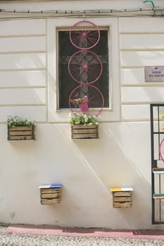 Pink bicycle wheel in  Alguero , sardinia, italy