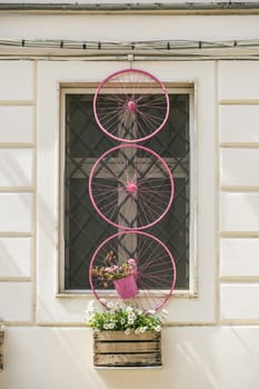 Pink bicycle wheel in  Alguero , sardinia, italy
