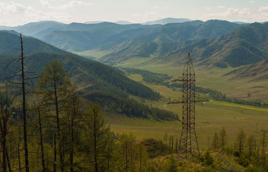 Electric pillar in the mountain, sunny day