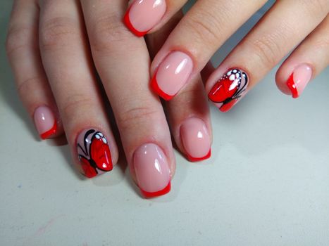 Here is presented one of the best manicure designs this year's Nail red butterfly