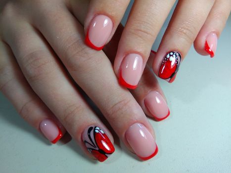 Here is presented one of the best manicure designs this year's Nail red butterfly