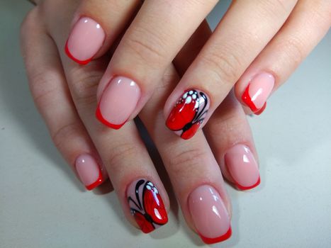 Here is presented one of the best manicure designs this year's Nail red butterfly