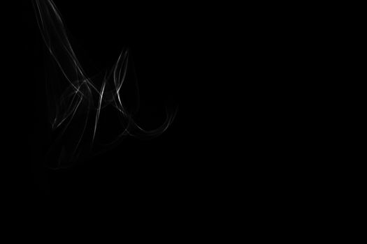 Light painted glowing abstract black and white curved lines on a black background