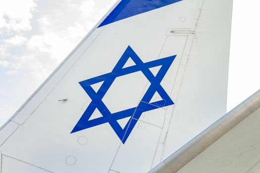 Tailplane of an airplane with a drawing of the Israeli flag.
