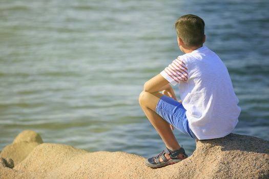 Young boy seeing the sea