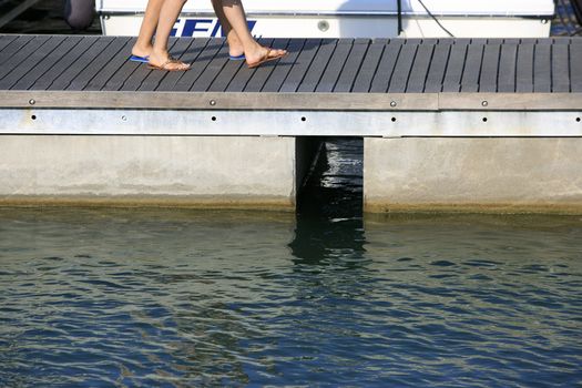 Couple walking on the port pier