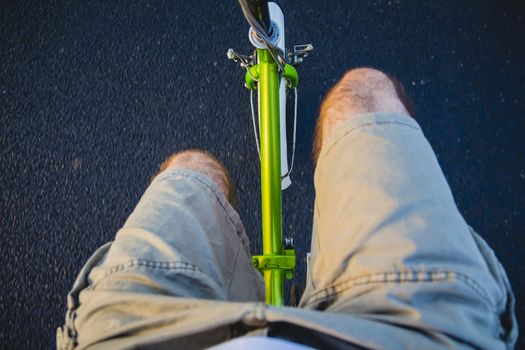 Riding a bike on the road. Original point of view (POV).