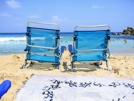Two chairs on the beach to relax