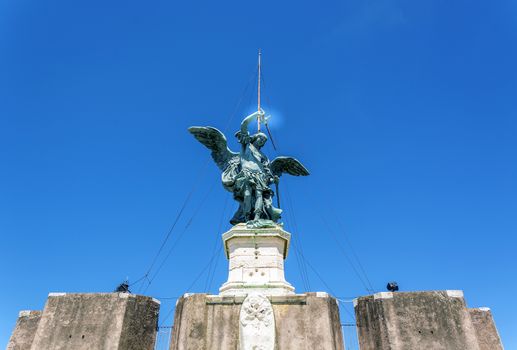 Bronze Statue of the archangel Michael on top of Castel Sant Angelo (castle of the holy angel)  in Rome, Italy