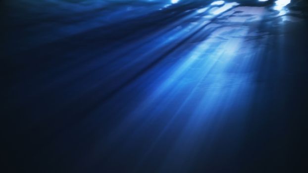 High quality ocean waves from realistic underwater. Light rays shining through. Computer graphic 3d rendering