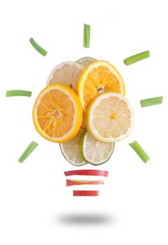 Light bulb made of fruit over a white background