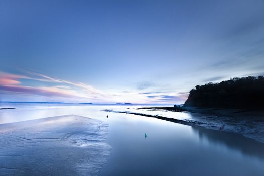 Calm sea and mountain near cardiff bay, UK