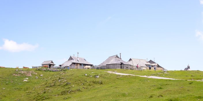 Velika planina plateau, Slovenia, Mountain village in Alps, wooden houses in traditional style, popular hiking destination