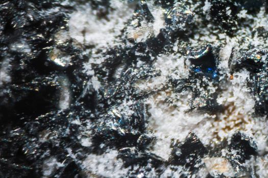 Black nail file under the microscope. Closeup macro photography.