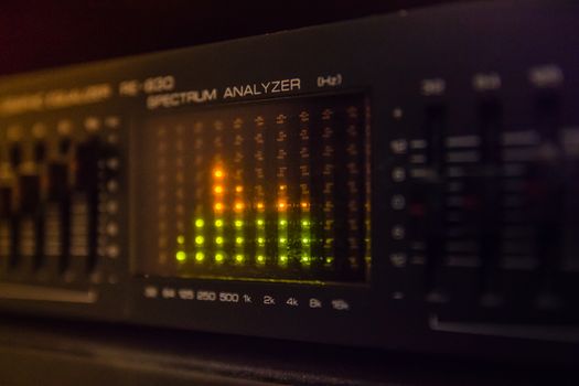 Graphic equalizer bars on an audio system - Close Up Selective Focus

