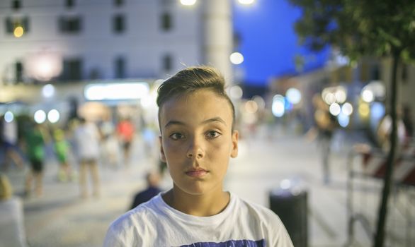 Boy with beautiful green eyes looking at the camera