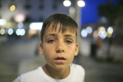 Boy with beautiful green eyes looking at the camera