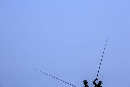 fisherman fishing on the coast of Sardinia
