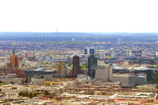 Aerial view of Berlin skyline with colorful buildings.