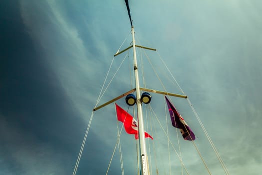 Low angle view of yacht sails.